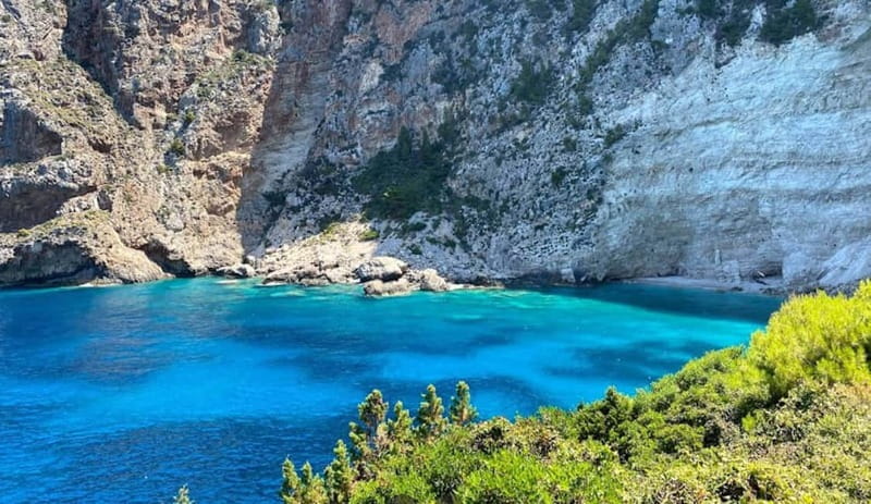 Zakynthos: Blue Caves and Navagio Bay Swim Cruise - Passing the natural arch and monastery ruins