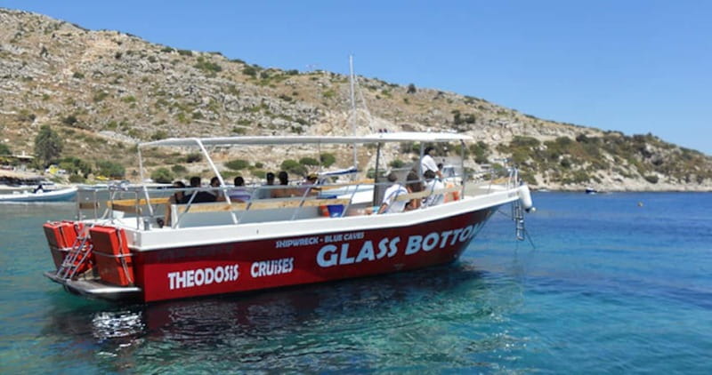 Zakynthos: Blue Caves and Navagio Bay Swim Cruise - Entering the Blue Caves by small boat