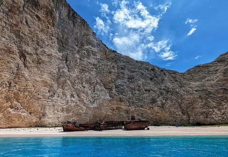 Zakynthos: Blue Caves and Navagio Bay Swim Cruise - Leaving Agios Nikolaos Harbour